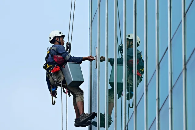 glass cleaner, worker, man, construction, building, worker, worker, worker, worker, worker. Writing a headline around the work a person actually does